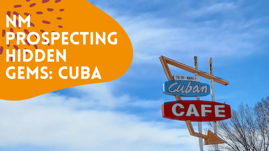Picture of New Mexico blue sky, clouds, and retro sign that reads "Cuban Cafe"